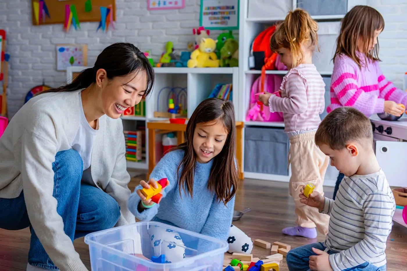 Happy children learning and playing at Junior Academy Kids